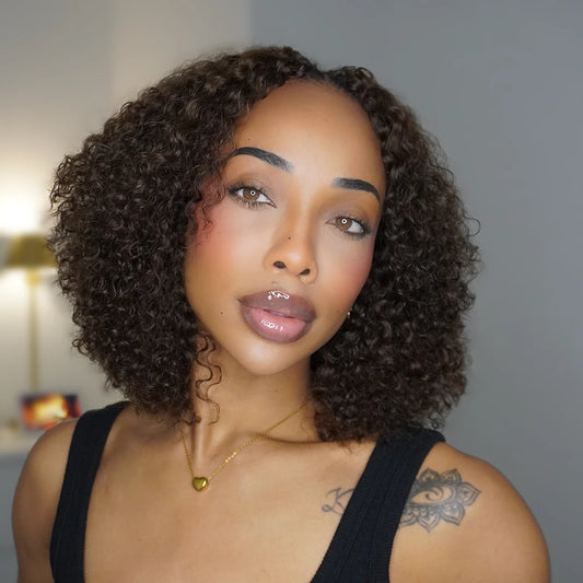 Side angle of Ywigs #T1B/4 Ombre Burmese Curly human crochet hair showing defined curls and full texture