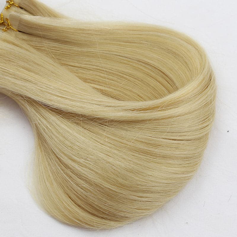 613 Platinum Blonde tape in hair extensions silky straight 10