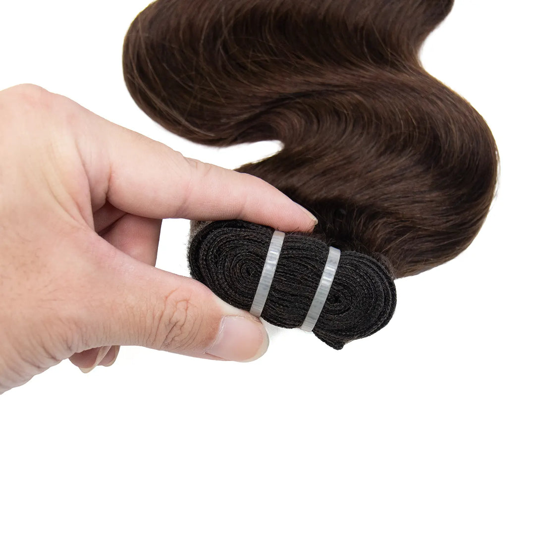 Close-up of the double machine-weft construction on Ywigs #4 Medium Brown Burmese Water Curly Human Hair