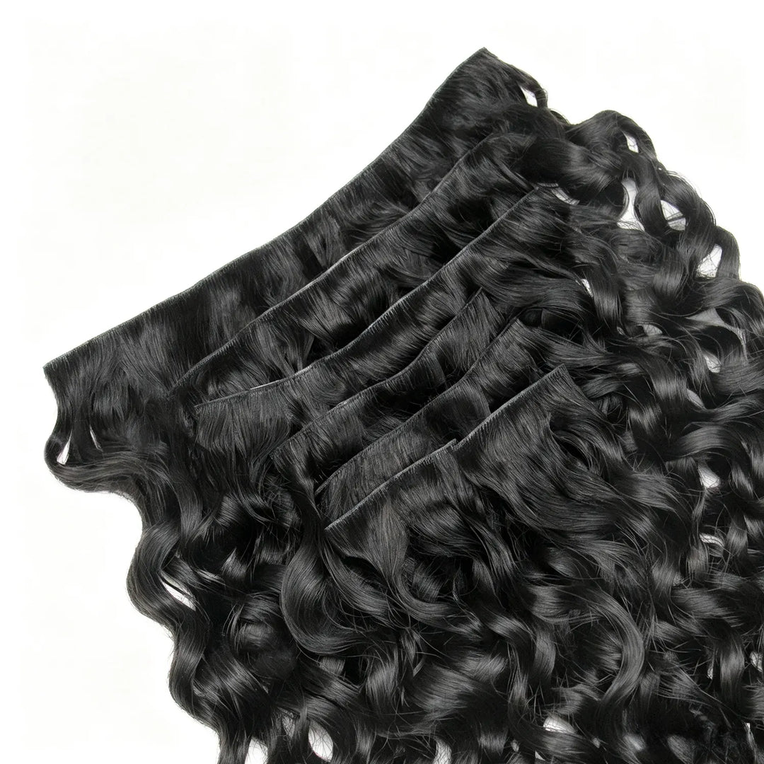 Close-up of Ywigs Invisible Edge Clip In Water Wave Hair Extensions showing defined water wave pattern and natural shine