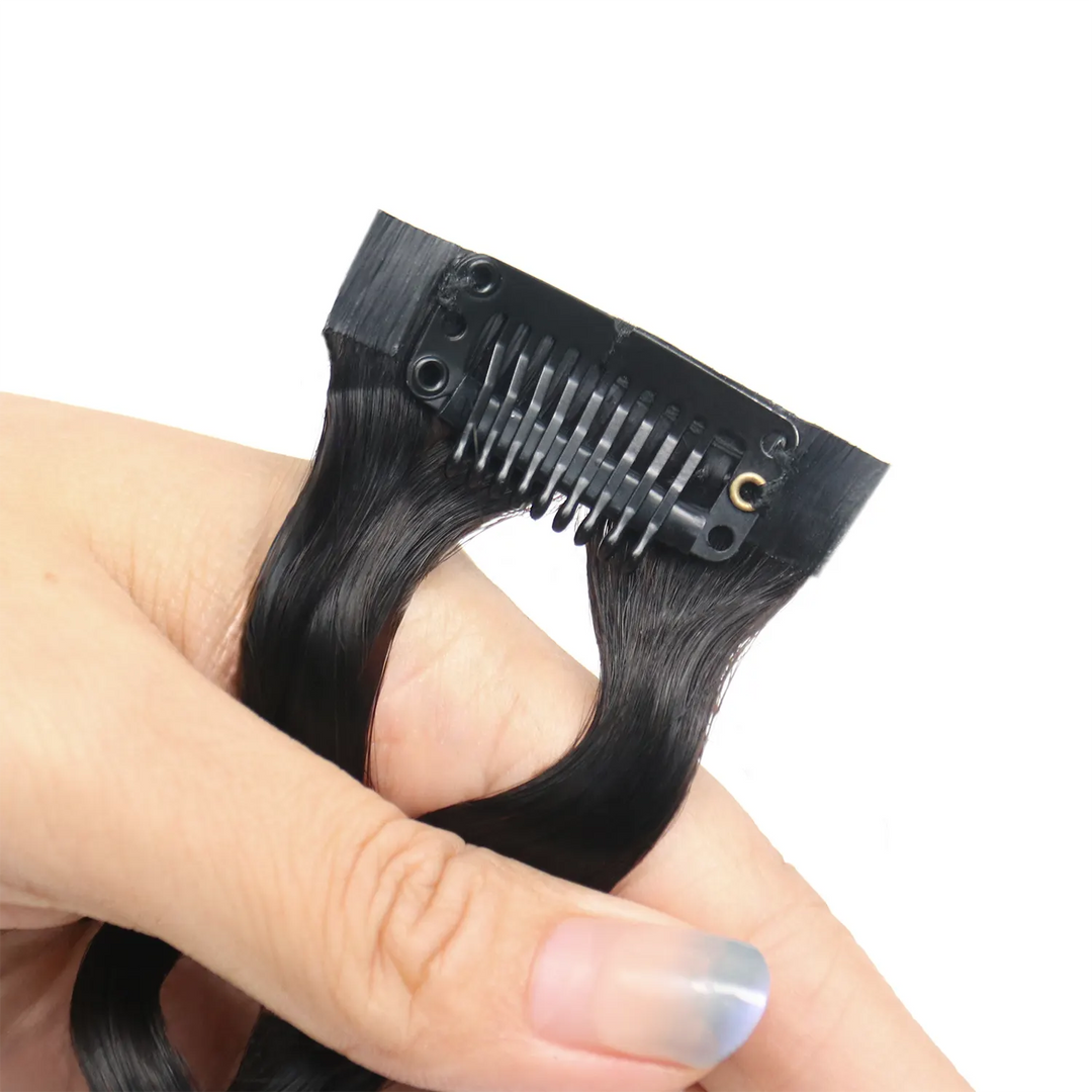 Close-up of Ywigs Invisible Edge Clip In Hair Extensions showing secure clips and seamless edge design