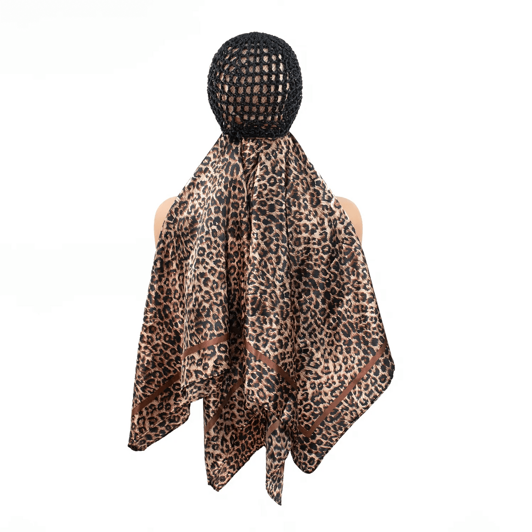Back view of model wearing Ywigs 2-in-1 Leopard Print Satin Hair Scarf with Mesh Cap showing the long flowing scarf
