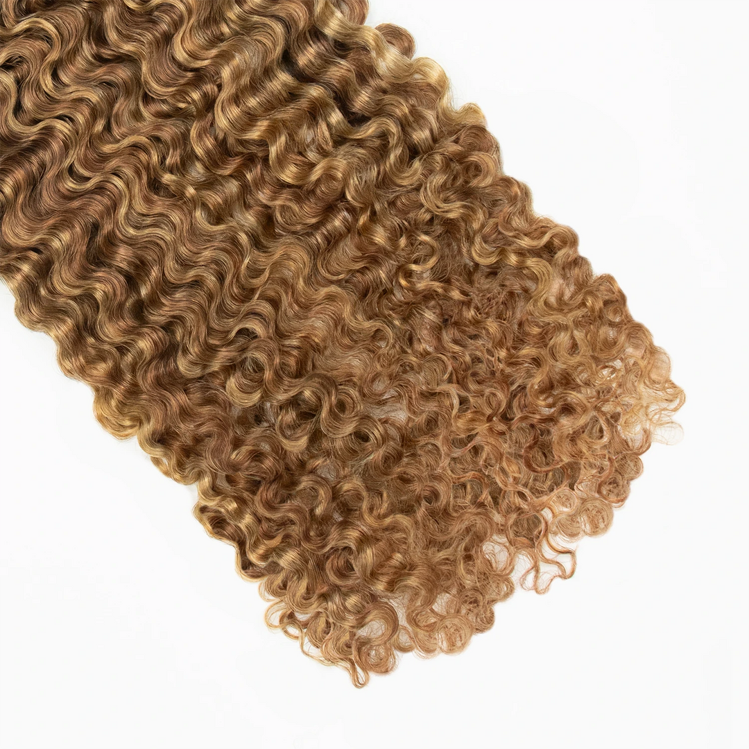 Close-up of Ywigs #27/30 Water Deep Wave Feather Crochet Hair ends showing soft defined waves