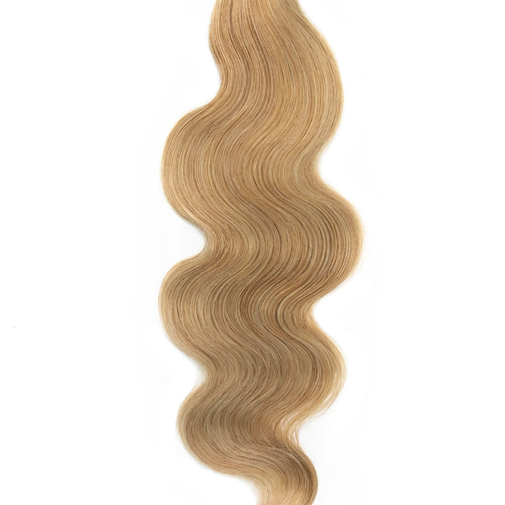 Close-up of Ywigs #27 Honey Blonde Body Wave Braiding Hair showing defined body wave pattern and soft texture