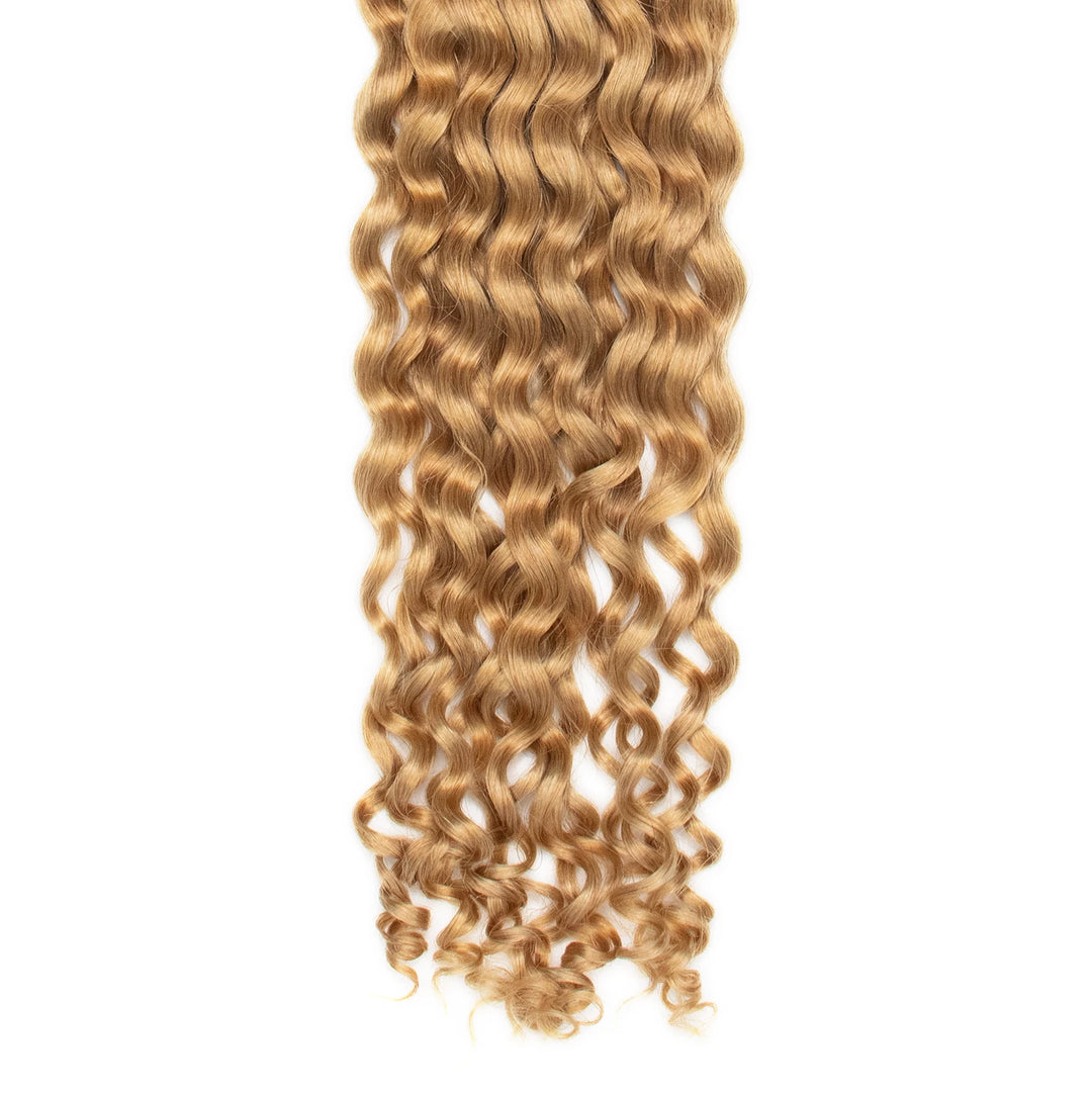 Close-up of Ywigs #27 Honey Blonde Spanish Curl Human Bulk Hair ends showing defined curls and soft texture