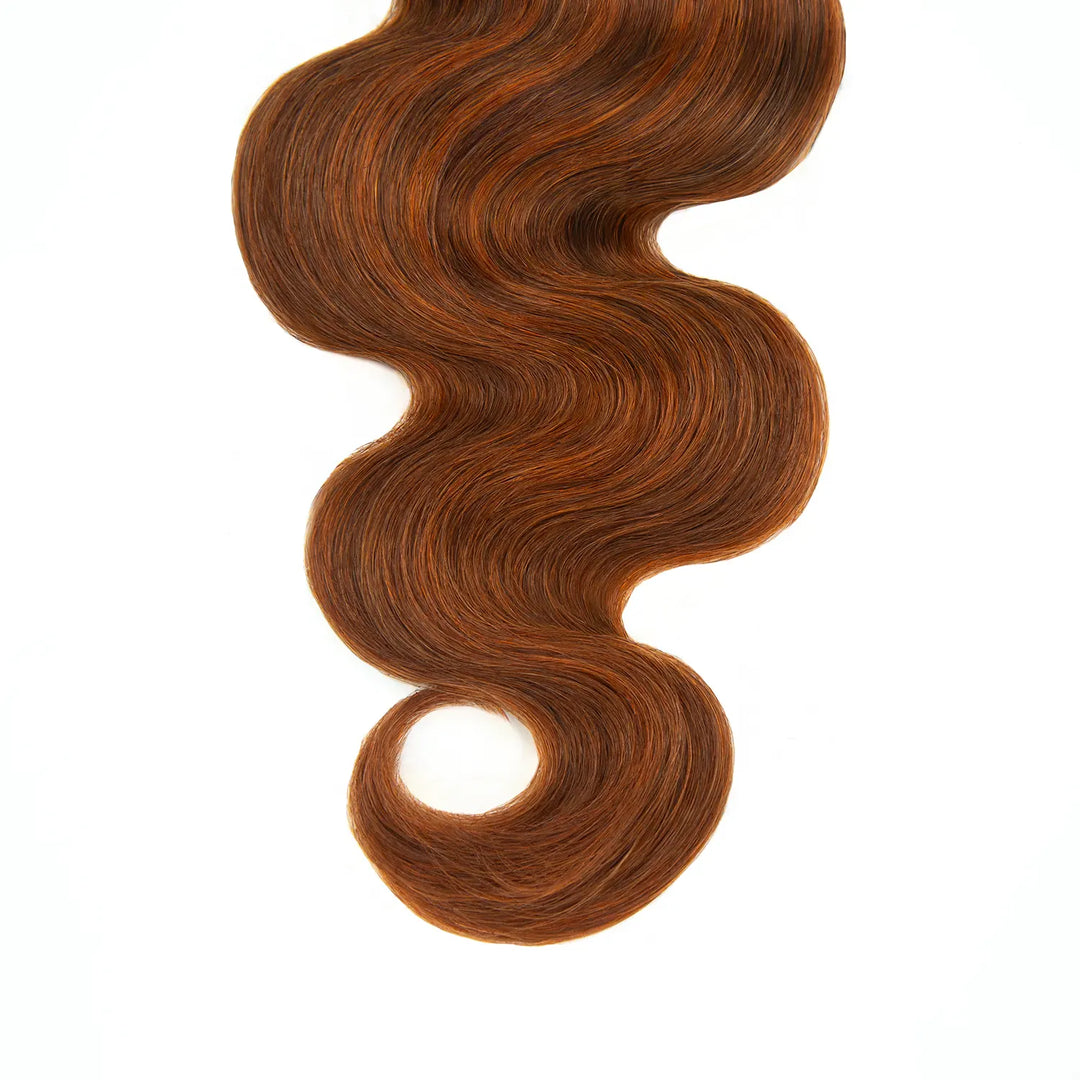 Close-up of Ywigs #350/Auburn Body Wave Bulk Human Braiding Hair ends showing soft, defined waves