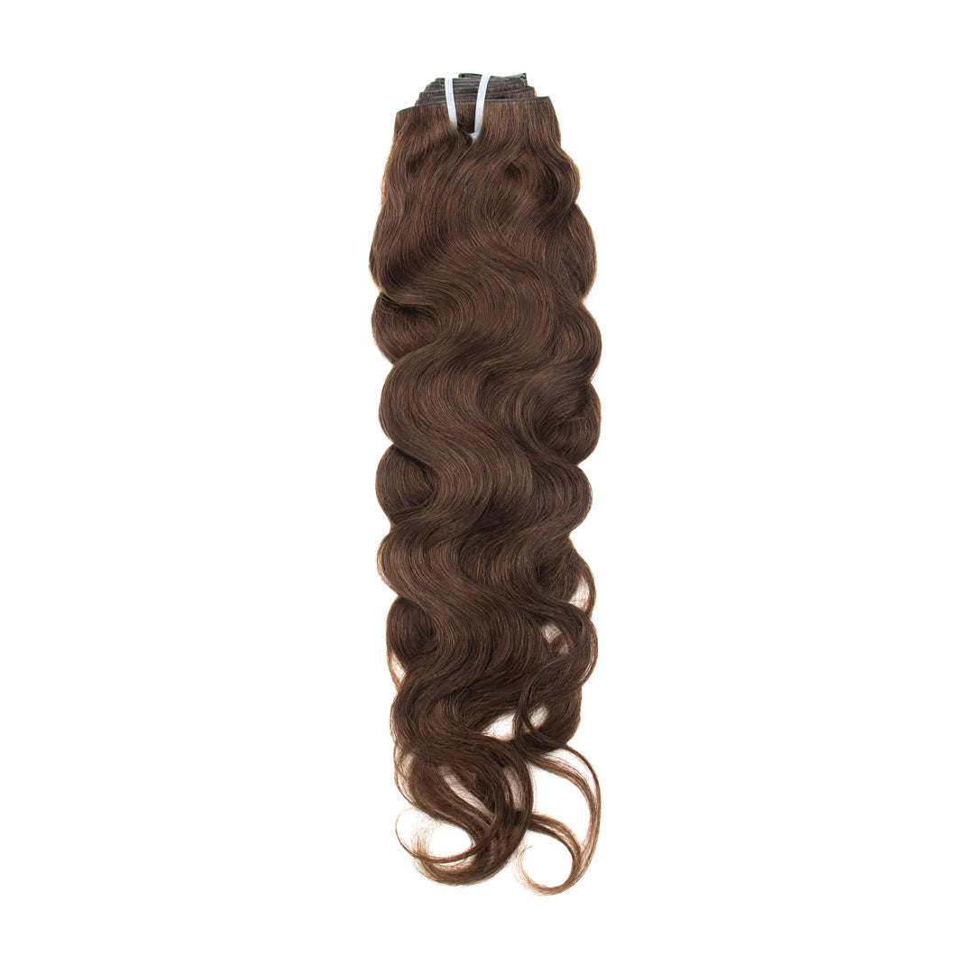 Single Ywigs #4 Medium Brown Body Wave Clip In Hair Extension showing the wavy texture and clip attachment