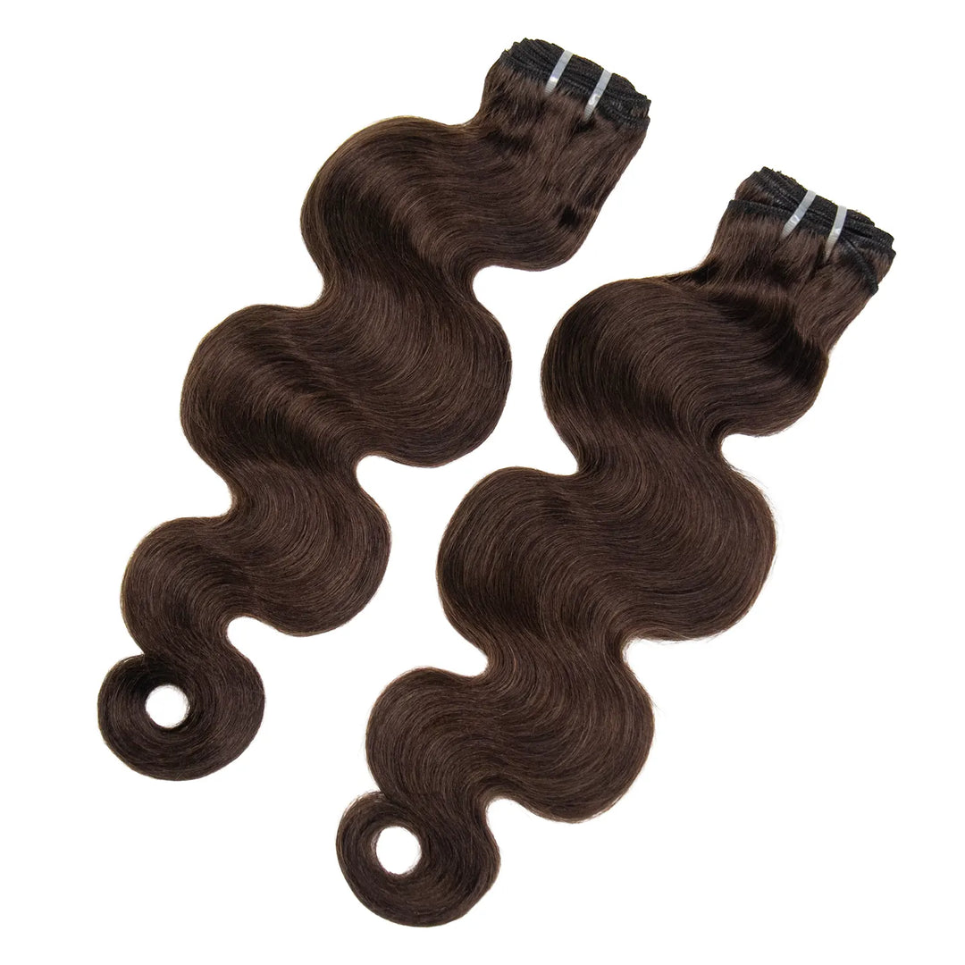 Two bundles of Ywigs #4 Medium Brown Burmese Water Curly Human Hair showing the defined waves