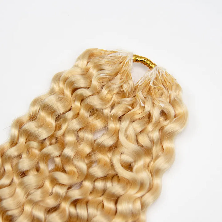 Close-up of the top of Ywigs #613 Platinum Blonde Water Wave Human Crochet Hair showing the hair attachment and blonde strands