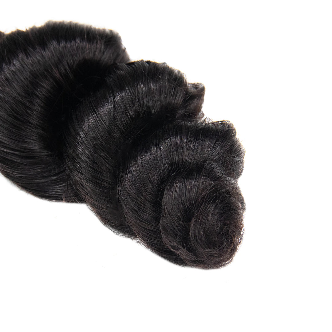 Close-up of Ywigs Double Drawn Burmese Loose Wave Human Braiding Hair ends showing soft, full waves