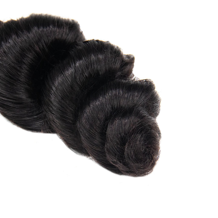 Close-up of Ywigs Double Drawn Burmese Loose Wave Human Braiding Hair ends showing soft, full waves