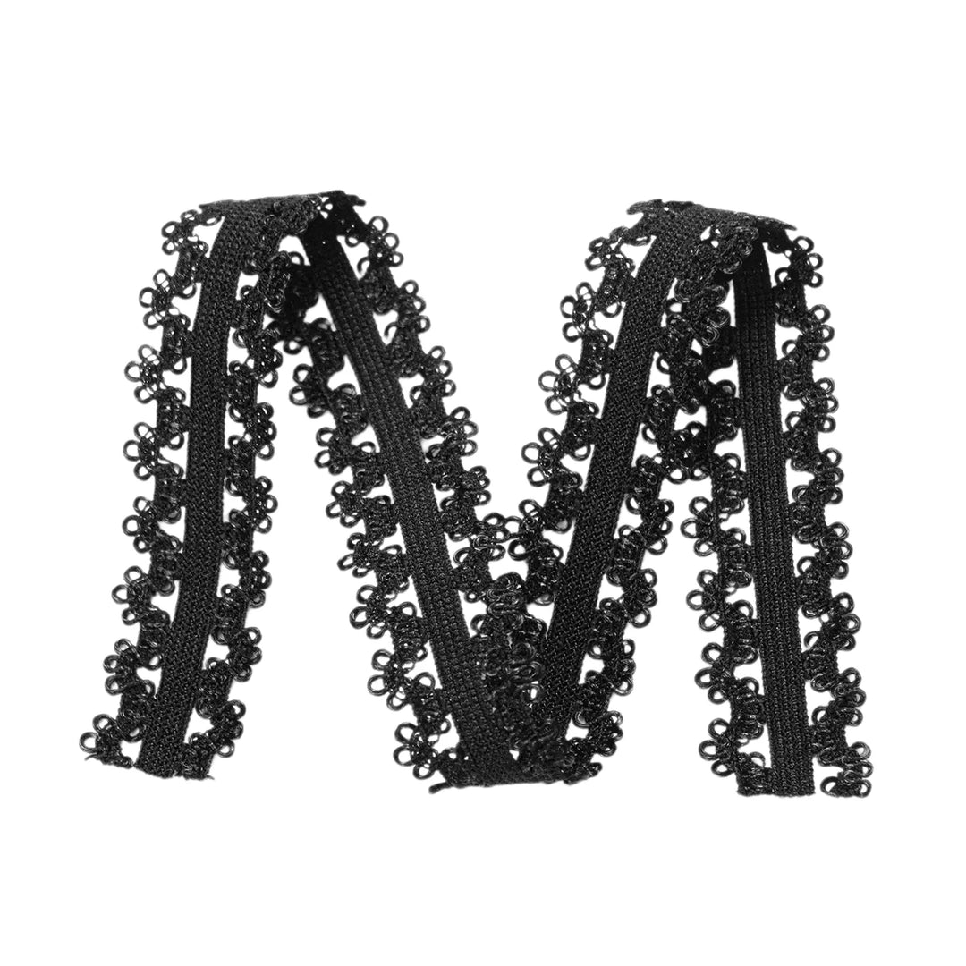 Black elastic lace band arranged in an M shape for DIY faux edges.
