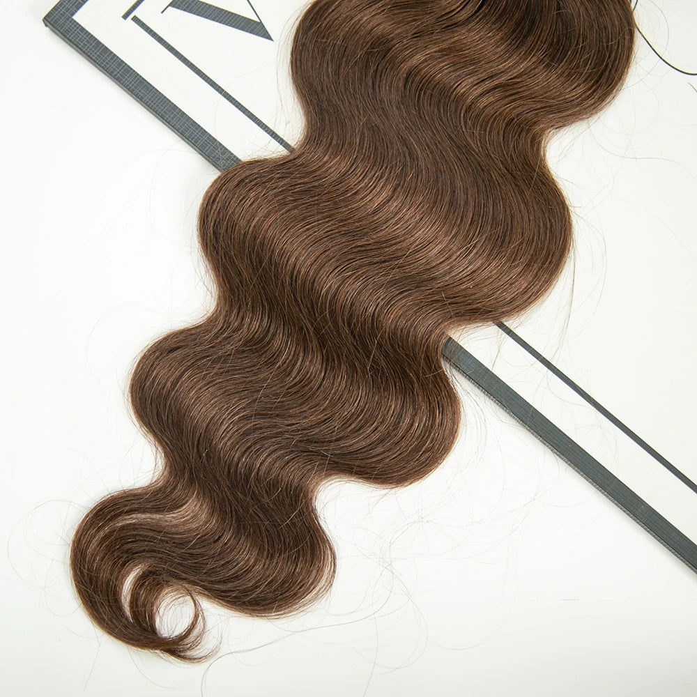 Close-up of Ywigs knotless feather crochet hair tips showing lightweight feathered ends and seamless construction