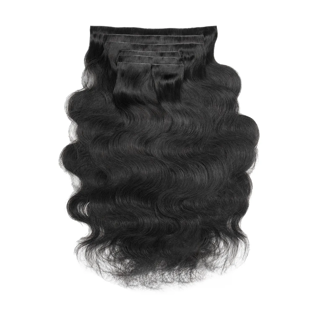 Detailed view of Ywigs Invisible Edge Clip In Body Wave Hair Extensions showing full volume and flowing wave texture