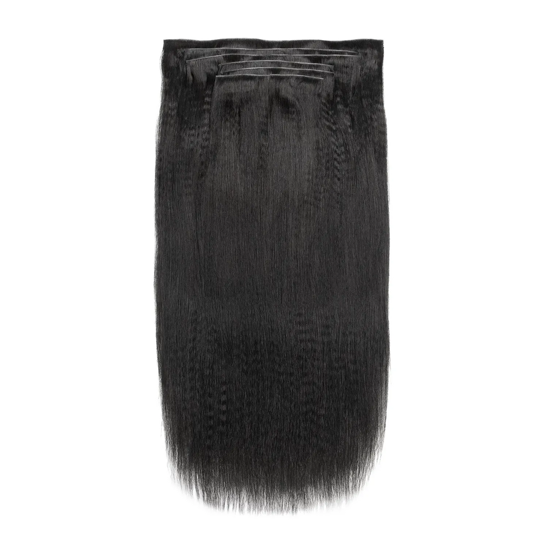 Detailed view of Ywigs Invisible Edge Clip In Yaki Straight Hair Extensions showing full volume and textured pattern