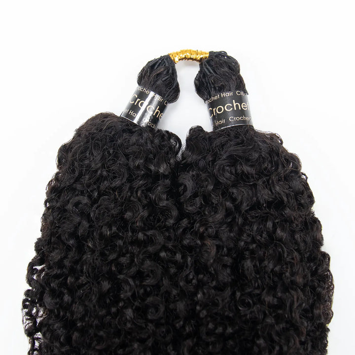 Close-up of two Ywigs Kinky Curly Crochet Hair bundles showing the tightly coiled texture and natural black color.