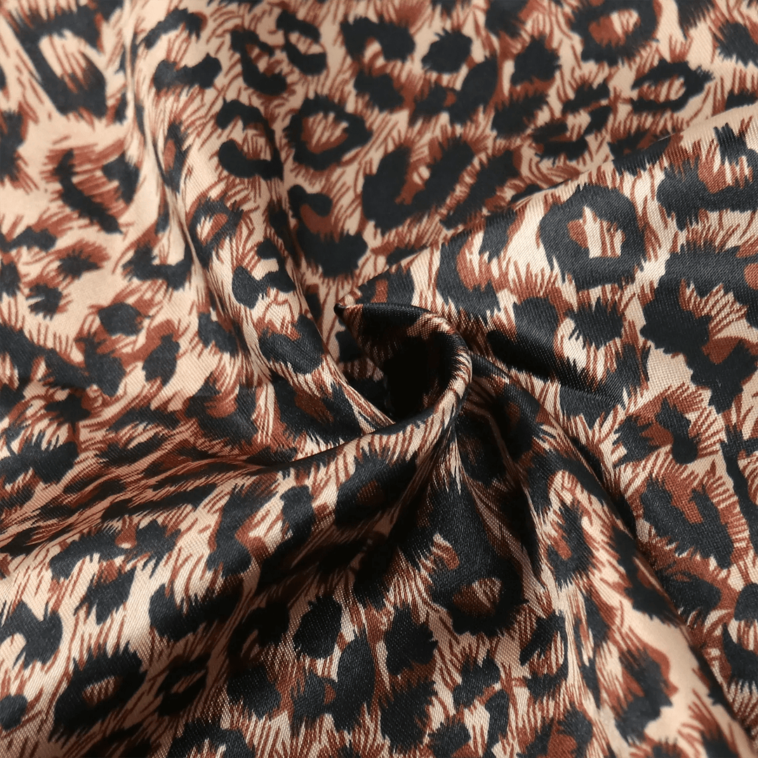 Close-up of Ywigs Leopard Print Satin Hair Scarf showing the smooth satin fabric and leopard print pattern