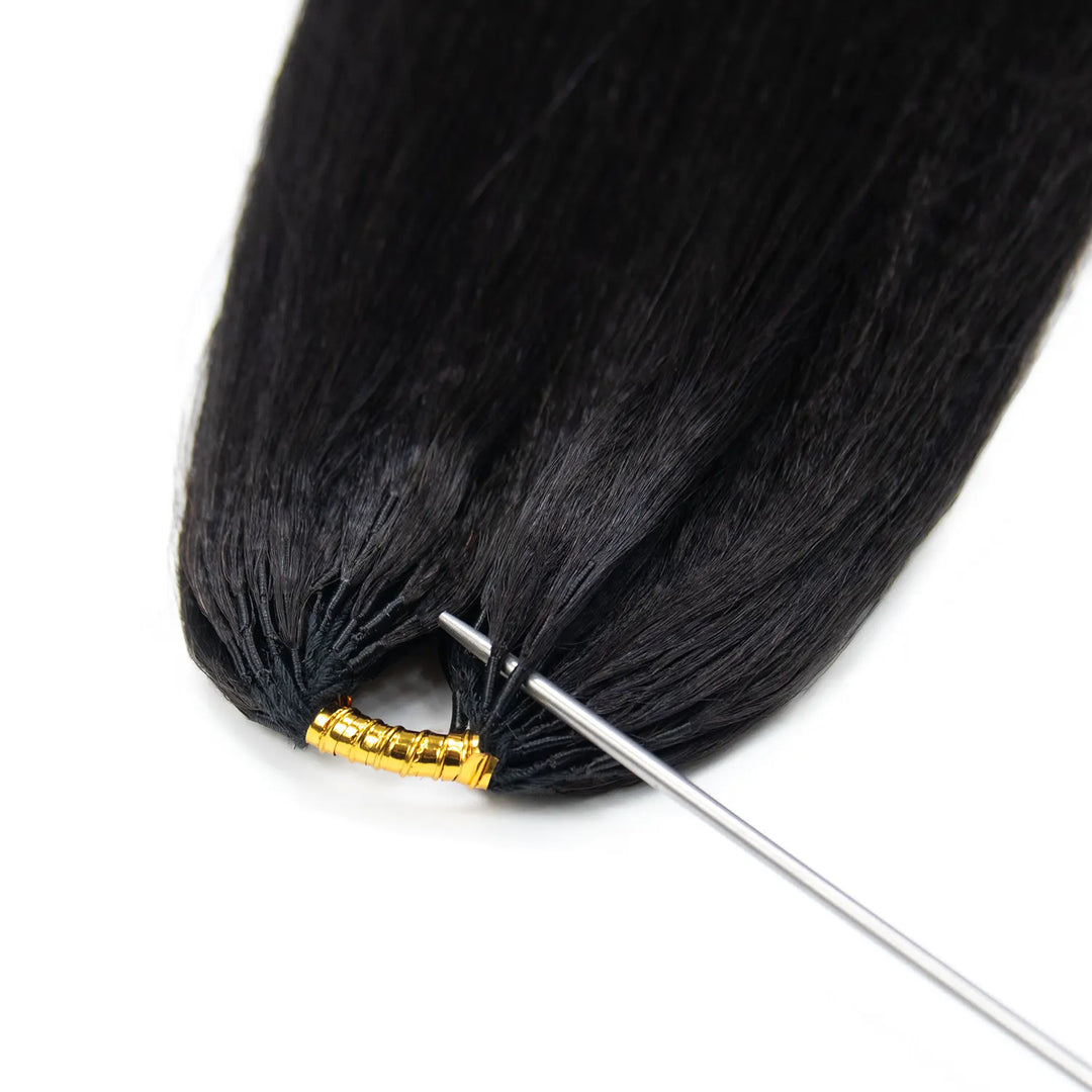 Detailed view of the upper section of Ywigs Light Yaki Human Crochet Hair, highlighting the gathered hair strands and attachment structure.