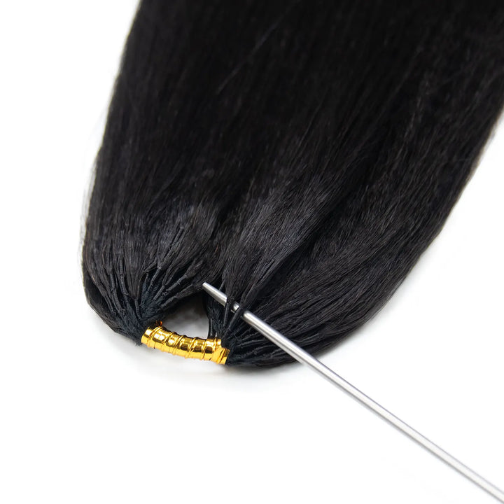 Detailed view of the upper section of Ywigs Light Yaki Human Crochet Hair, highlighting the gathered hair strands and attachment structure.