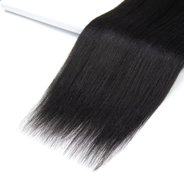 Close-up of Ywigs Light Yaki Human Crochet Hair showing its smooth strands and natural-looking straight texture.