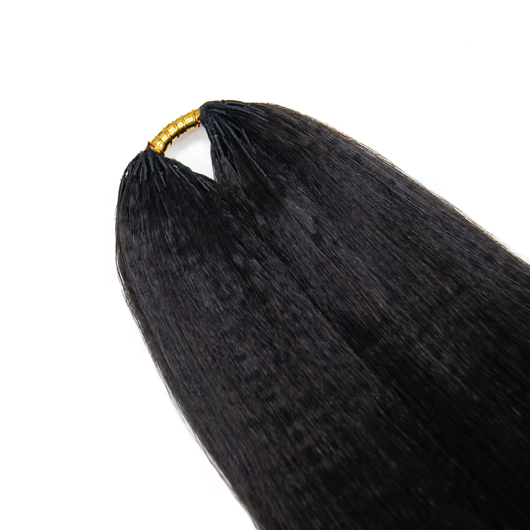 Close-up of the top attachment area of Ywigs Light Yaki Human Crochet Hair, showing the hair bundle construction.