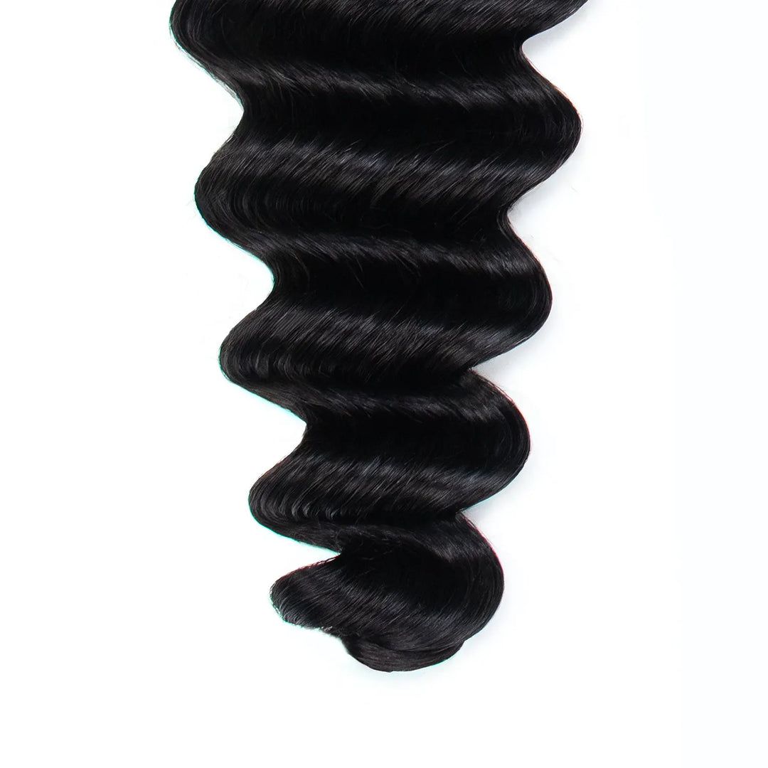 Close-up of the curled ends of Ywigs Loose Deep Wave Human Crochet Hair, highlighting its soft texture and natural-looking finish.