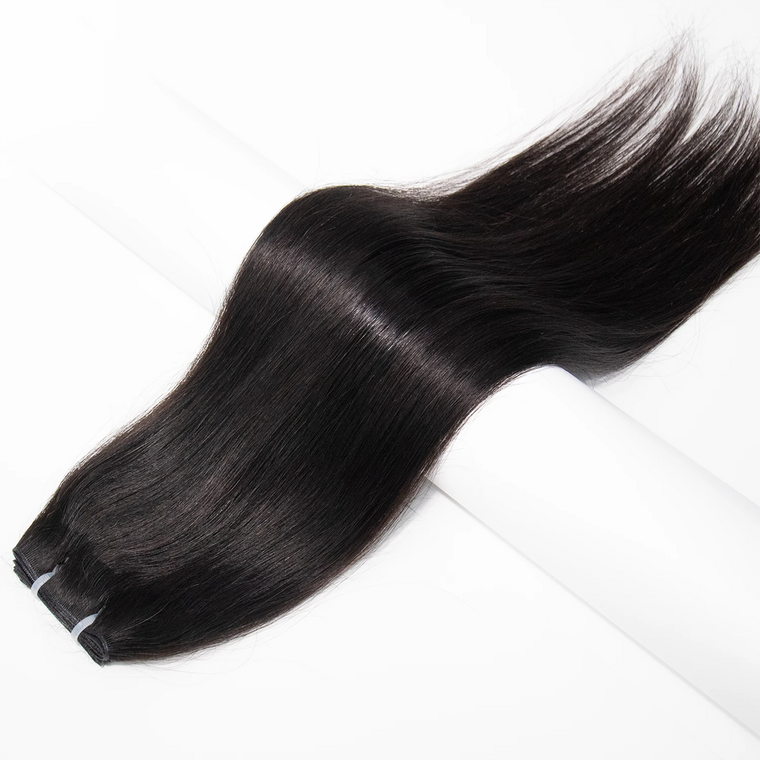 Close-up of Ywigs Silky Straight Genius Weft Human Hair showing defined spring twist curl pattern and soft texture