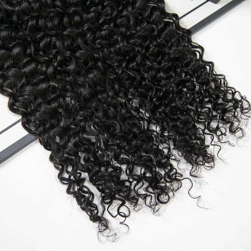 Close-up of Ywigs knotless feather crochet hair tips showing lightweight feathered ends and seamless construction