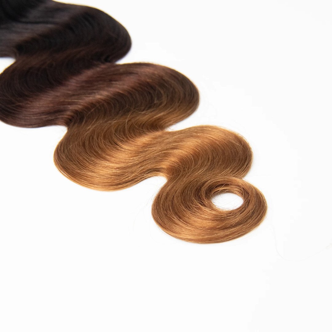 Close-up of Ywigs #T1B/4/30 Ombre Body Wave Human Crochet Hair ends showing soft waves and natural movement