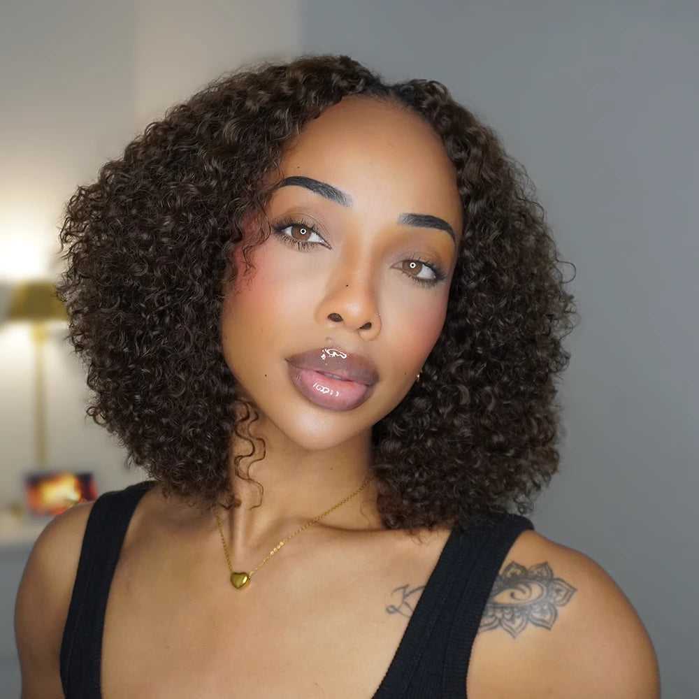 Side angle of Ywigs #T1B/4 Ombre Burmese Curly human crochet hair showing defined curls and full texture