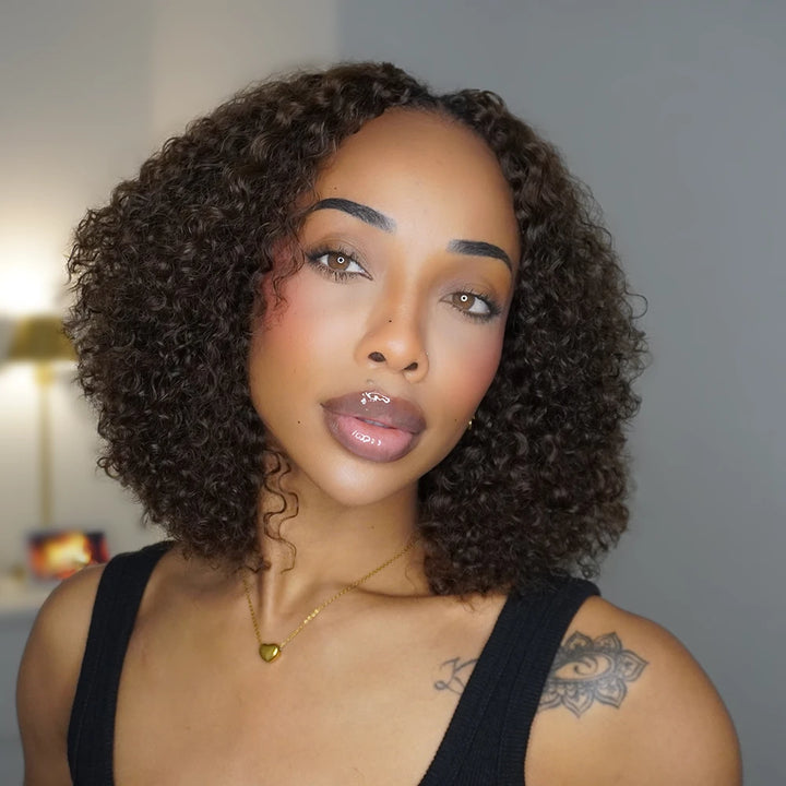 Side angle of Ywigs #T1B/4 Ombre Burmese Curly human crochet hair showing defined curls and full texture