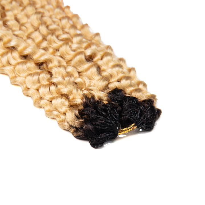 Top view of Ywigs #T1B/613 Ombre Water Wave Human Crochet Hair showing blended color and neat strands