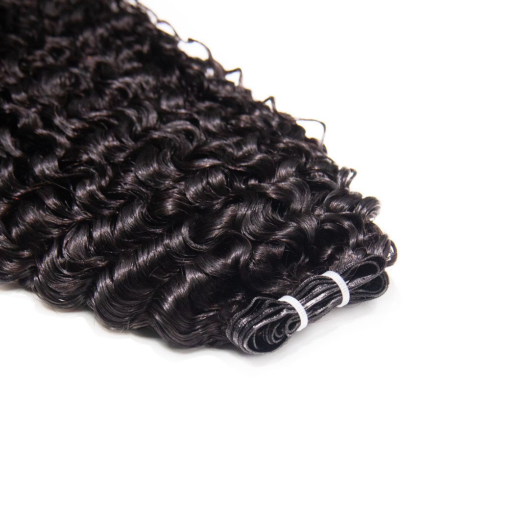 Close-up of Ywigs Water Curly Genius Weft Human Hair showing defined Water Curly pattern and soft texture