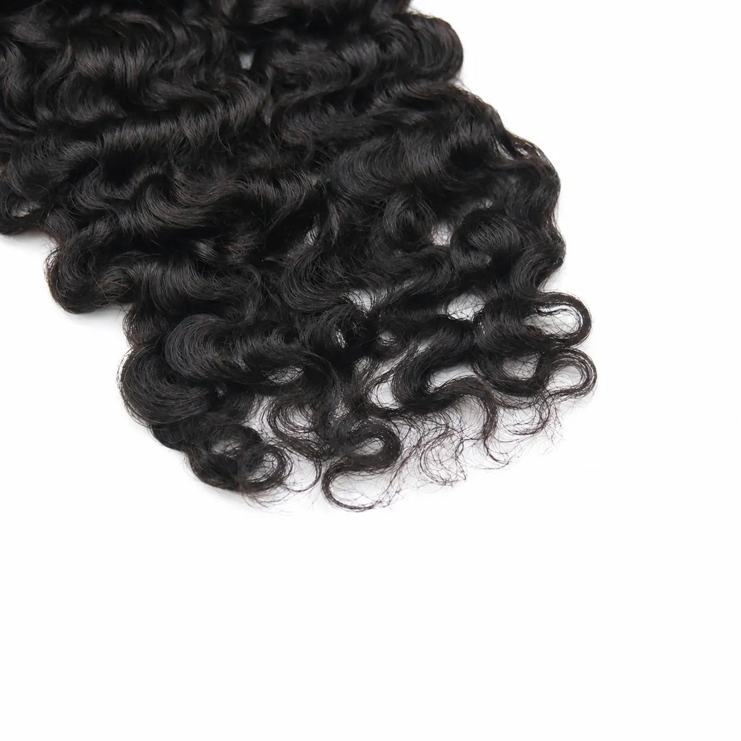 Close-up of Ywigs Water Deep Wave Human Crochet Hair showing defined waves and naturally curled ends.